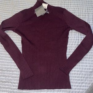 purple turtleneck sweater